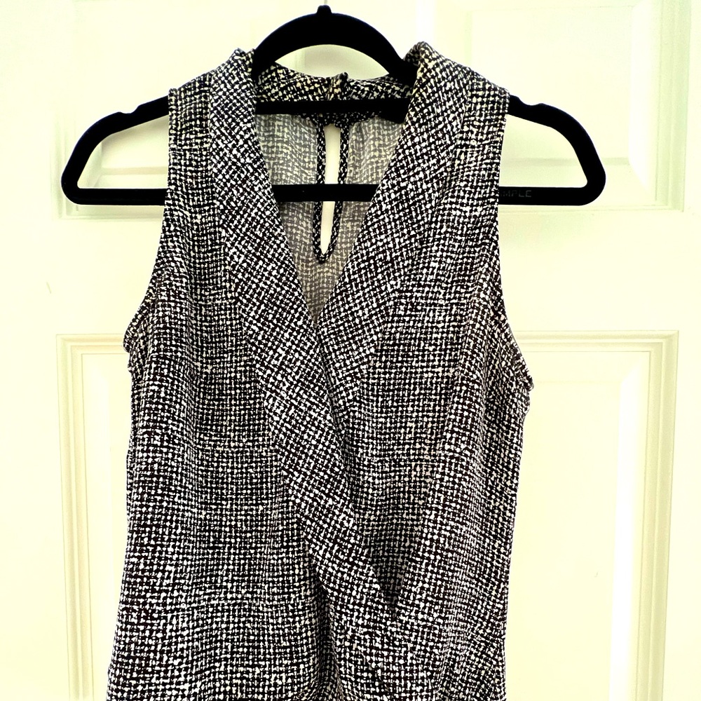 Gently worn tank top with gathered waistline